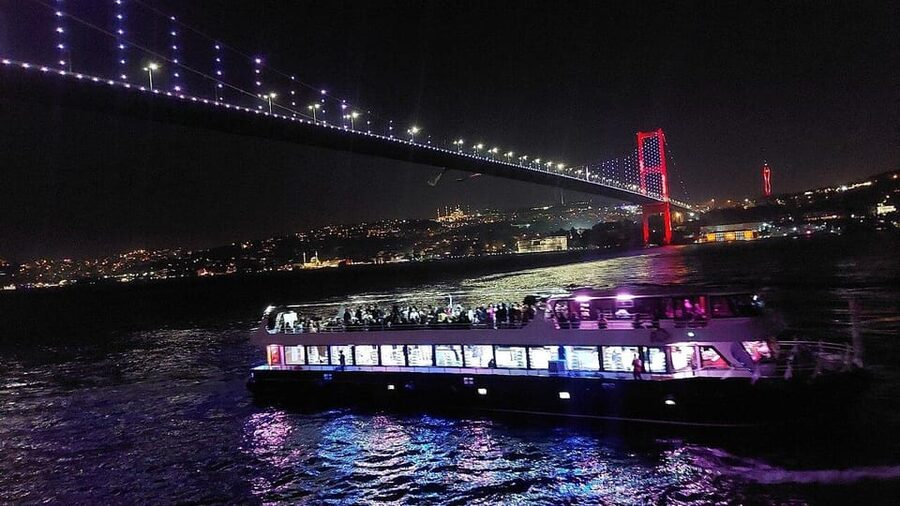 All Inclusive; Istanbul Bosphorus Dinner Cruise w/live shows - Istanbul at night, framed by the Bosphorus