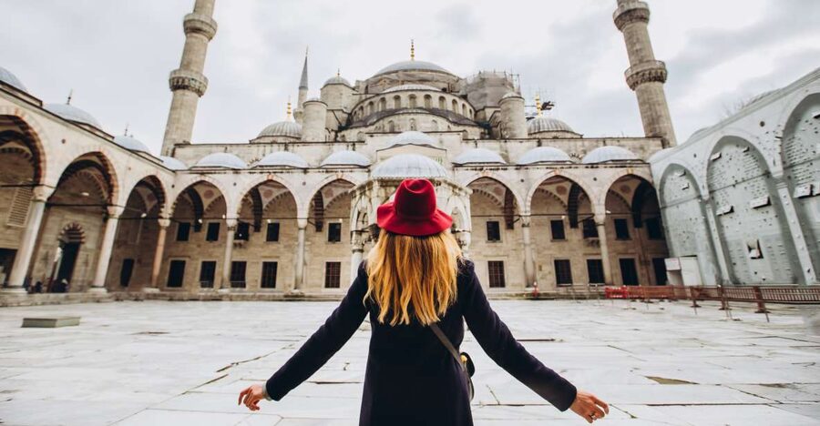 Blue Mosque: Art and Symbolism Guided Group Walking Tour - Entering Sultan Ahmed Mosque: Tiles, Light, and the 17th-Century Design