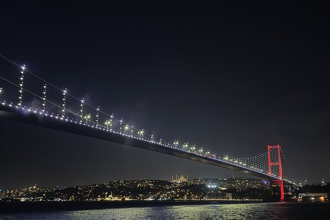 Bosphorus Night Lights: Guided Cruise With Tea and Cookies - The 15 July Martyrs Bridge and Fatih Sultan Mehmet Bridge: Europe and Asia Overhead