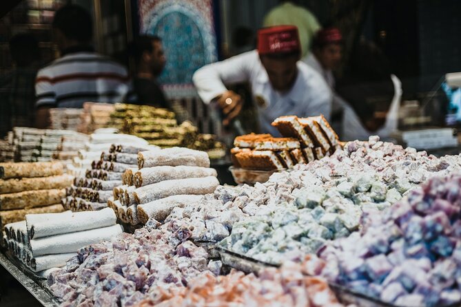 Istanbul Guided Walking Tours with Food and Beverage Tastings - Guides, group size, and the Caribou Coffee meeting point