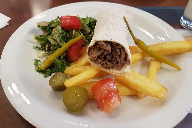 Istanbul Kadikoy Private Food Tour with 12+ Local Tastings - Stop 3 at Viktor Levi Şarap Evi: Turkish coffee, wine, and local food stories