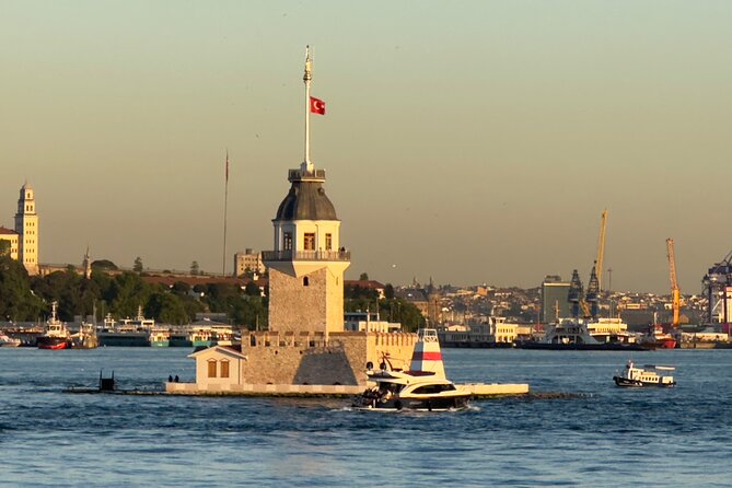 Luxurious Bosphorus Small Group Sunset Yacht Cruise with Snacks - Onboard setup: snacks, unlimited refills, and the audio in English