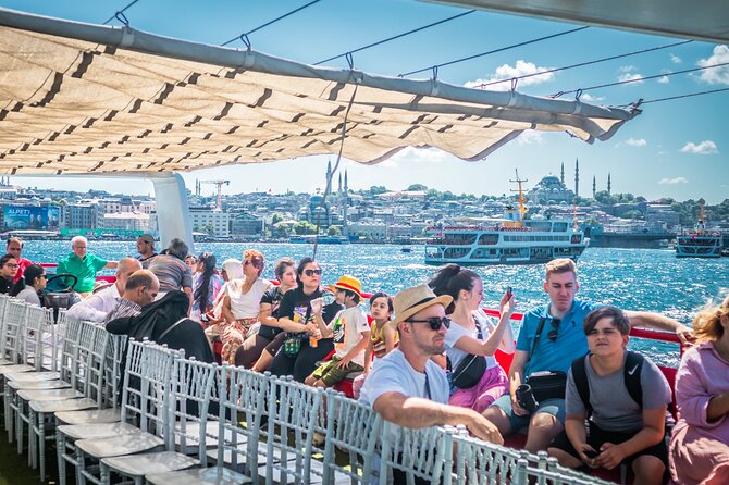 Short Bosphorus Cruise Tour With Hotel Pickup And Audio Guide - On Board Experience: Audio, Deck Choices, and Free Drinks